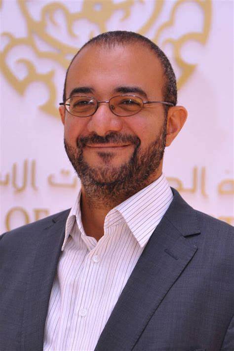 DR. JASSER AUDA